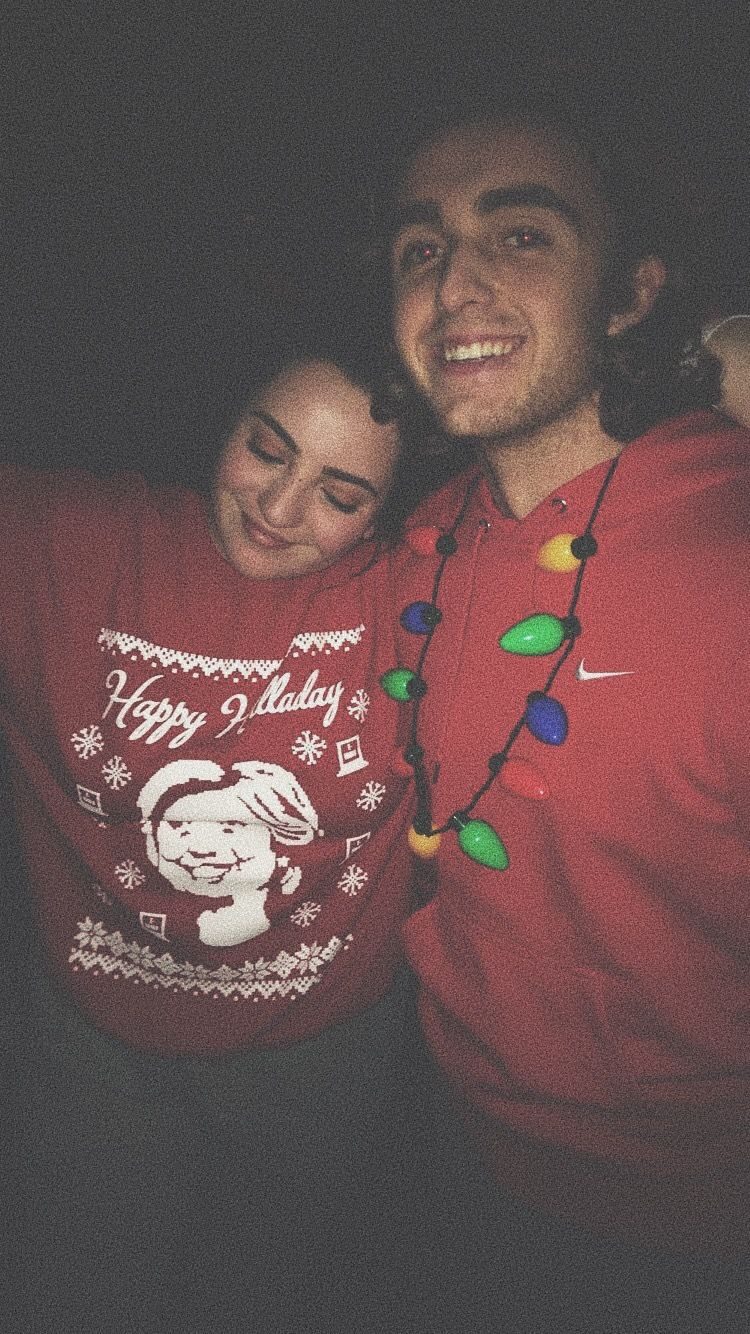 Lucca and Fiona in matching Christmas sweaters